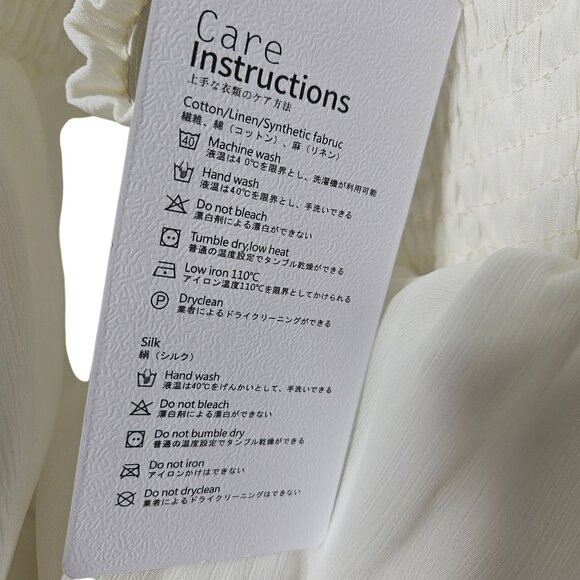 White Boho-Style Long Sleeve Dress With Smocked Waist & Open Back Tie Detail by - Picture 9 of 10